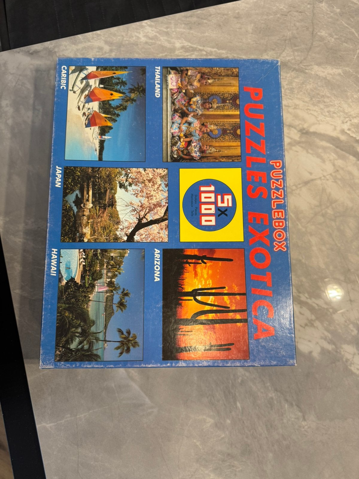 Puzzles exotica puzzle box 5x 1000 stukjes, Ophalen of Verzenden, Zo goed als nieuw