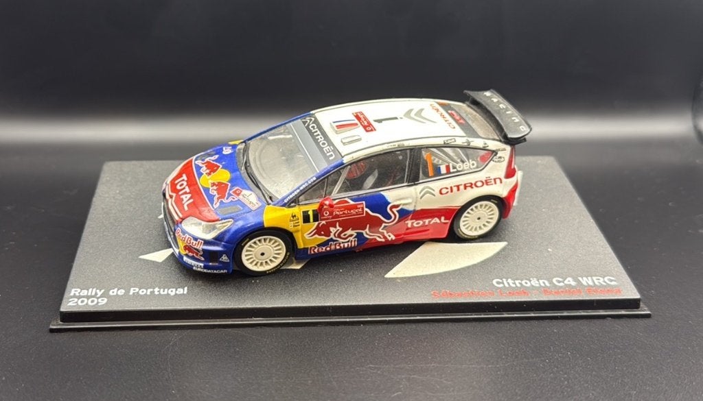 Citroën C4 WRC Rally de Portugal 2009 1:43, Ophalen of Verzenden, Zo goed als nieuw, Auto, Overige merken
