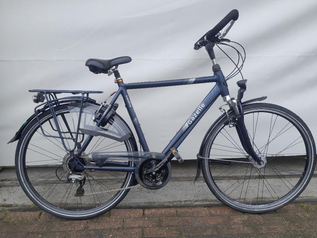 28 inch Gazelle Orange Trekking met 24 versnellingen., Ophalen, 28 inch, Gebruikt, Vering