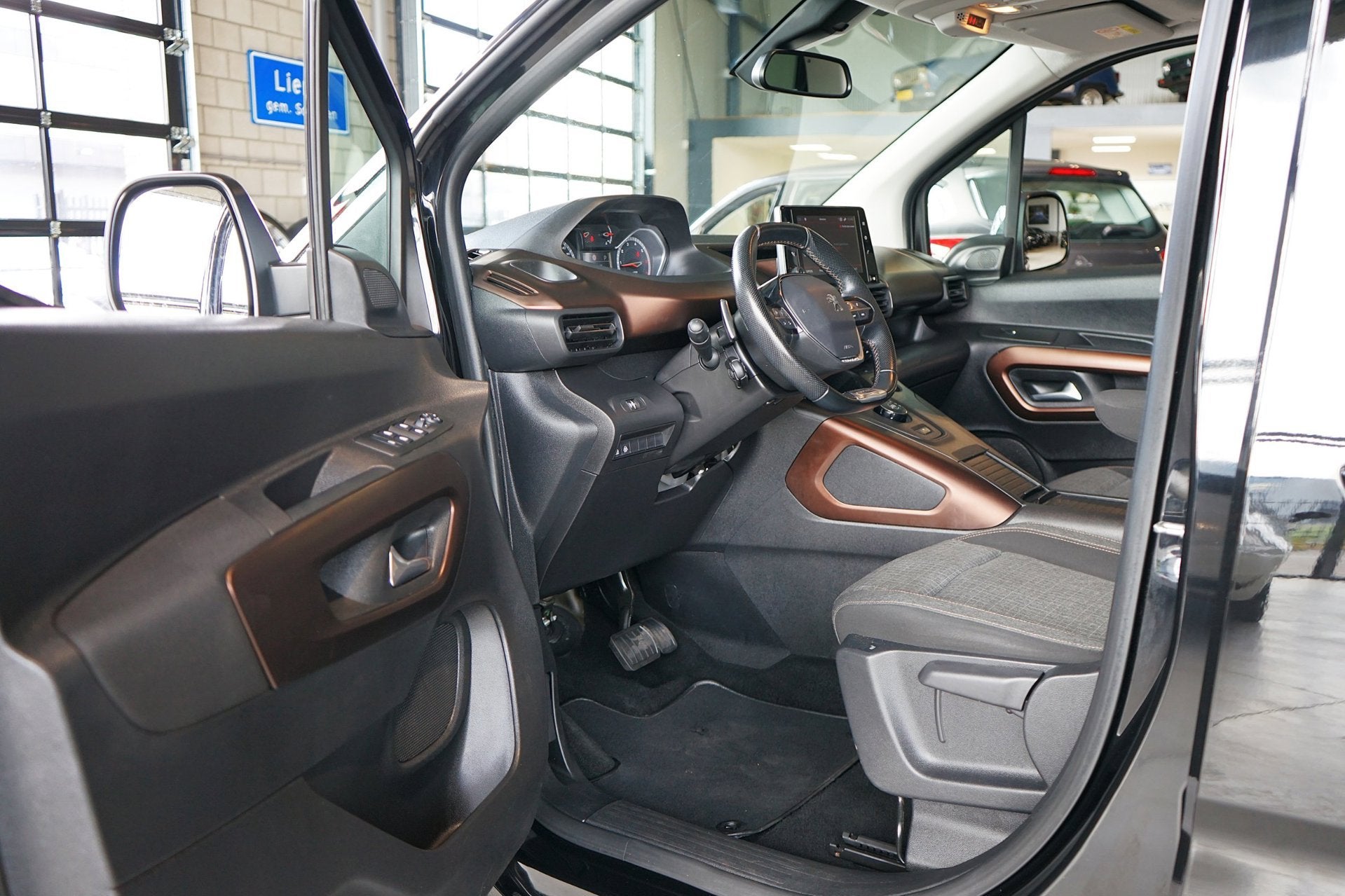Peugeot Rifter Long 1.2 Puretech Long GT-Line 7p.|TREKH|NAVI, Stof, Gebruikt, 1199 cc, Zwart