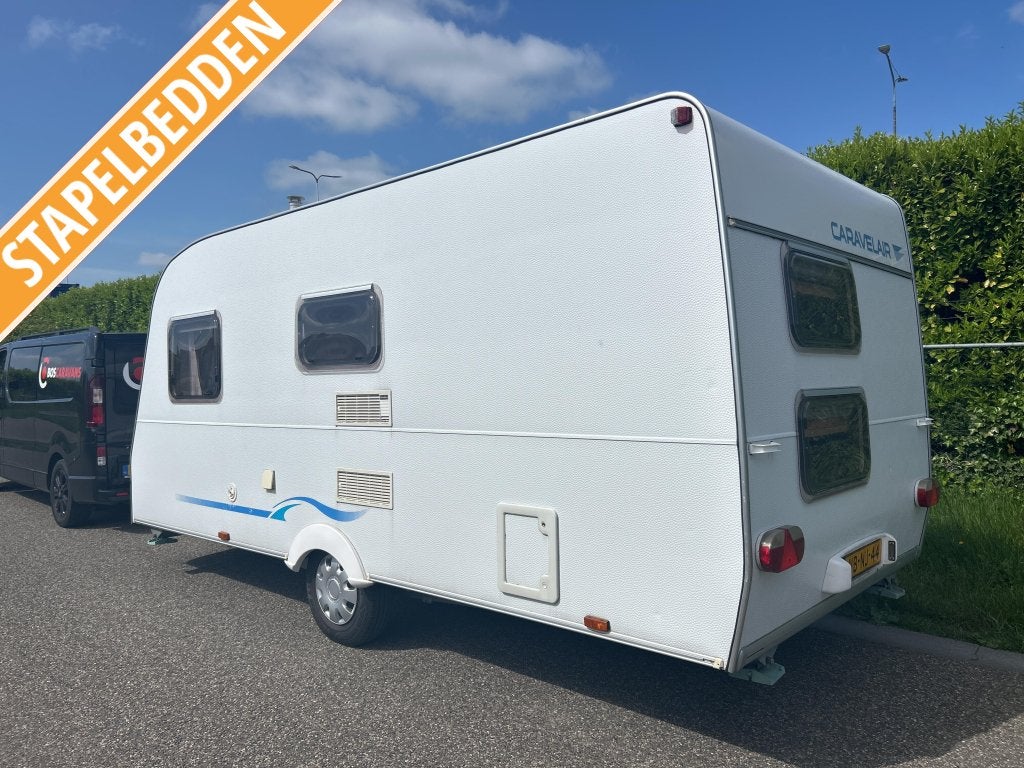 CARAVELAIR 496 Antares Luxe VOORTENT, VAST BED, STAPELBED, Overige typen, Treinzit, 750 - 1000 kg, Schokbreker