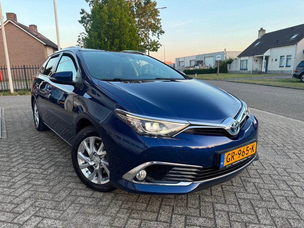 Toyota Auris Touring Sports 1.8 Hybrid Lease pro Panodak,Cam, Auto's, Gebruikt, Blauw, Leder en Stof, Origineel Nederlands