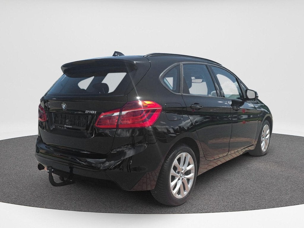 BMW 2-serie Active Tourer 218i Sport | Automaat | Cruise | P, Auto's, BMW, Gebruikt, Euro 6, Zwart, Bedrijf