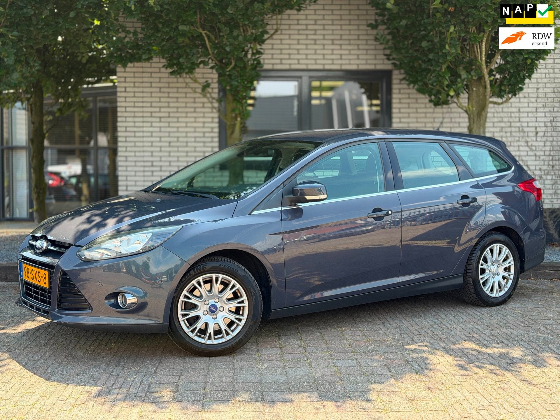 Ford Focus Wagon 1.6 EcoBoost Lease Titanium, Auto's, Gebruikt, 4 cilinders, 150 pk, Origineel Nederlands