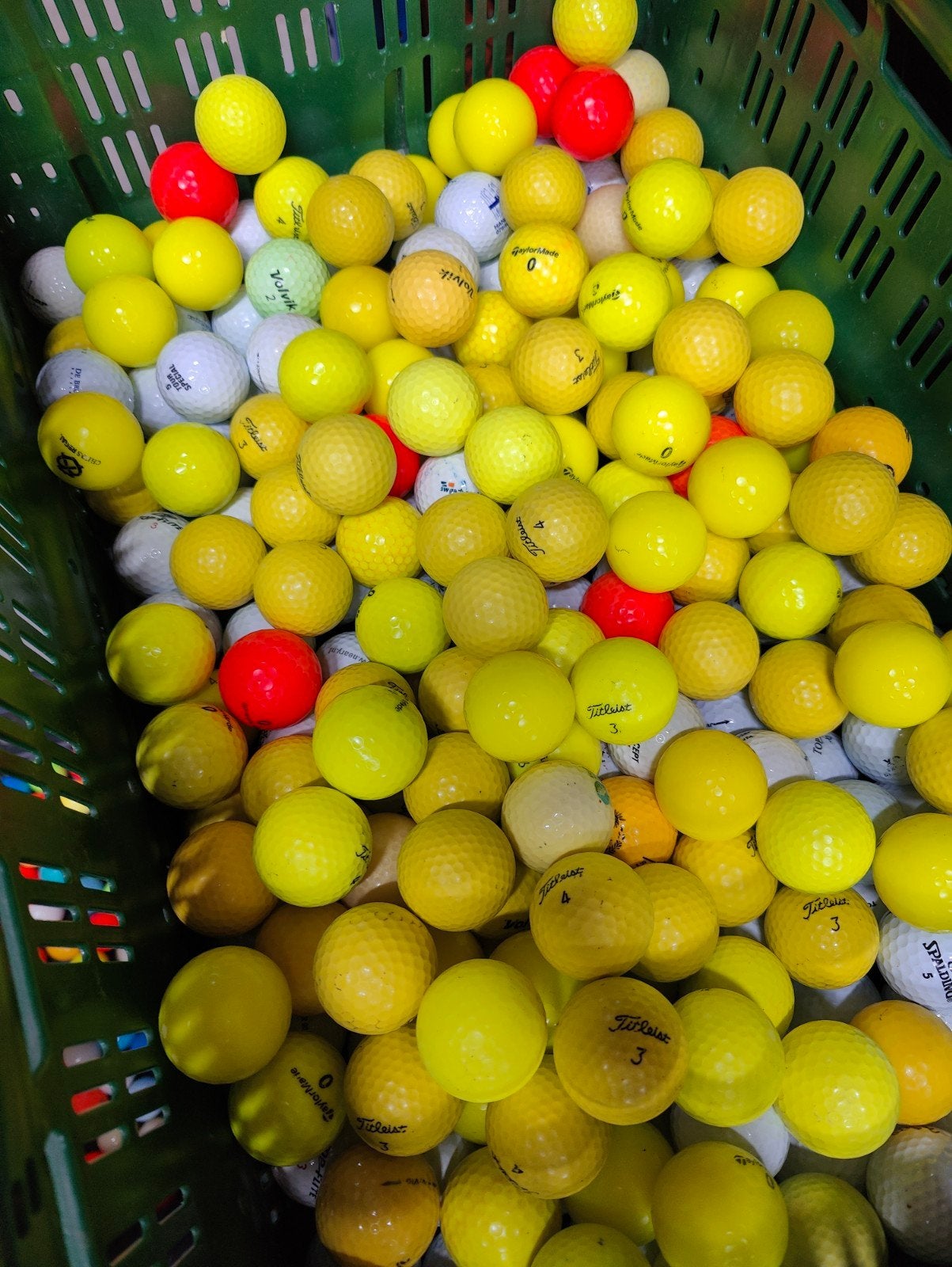 100 gele/oranje golfballen, Ophalen of Verzenden, Bal(len)