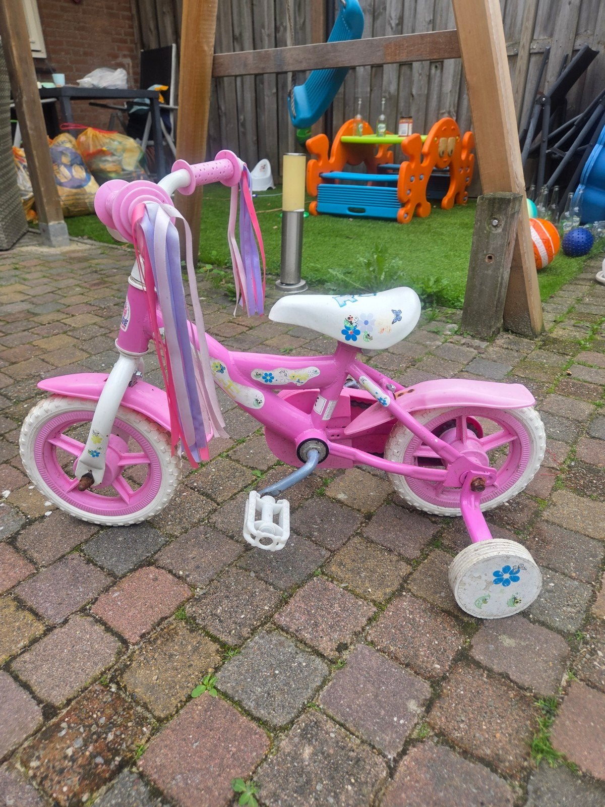 Roze kinderfiets met zijwieltjes - 10 inch, Ophalen, Terugtraprem, Zijwieltjes, Gebruikt