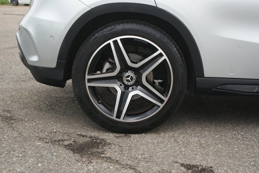 Mercedes-Benz GLA-klasse 180 ///AMG Pakket | Pano | Camera |, Gebruikt, 4 cilinders, 715 kg, 122 pk