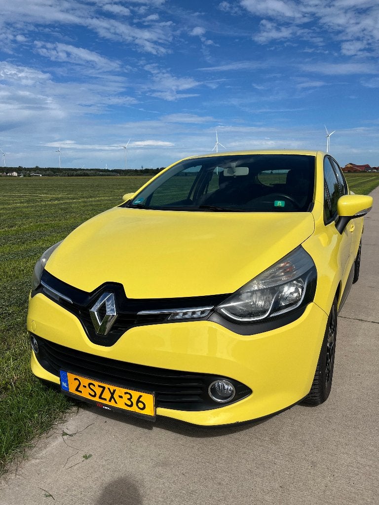 Renault Clio 0.9 TCE 66KW 5-DRS 2014 Geel, Auto's, Voorwielaandrijving, 898 cc, Stof, 40 €/maand