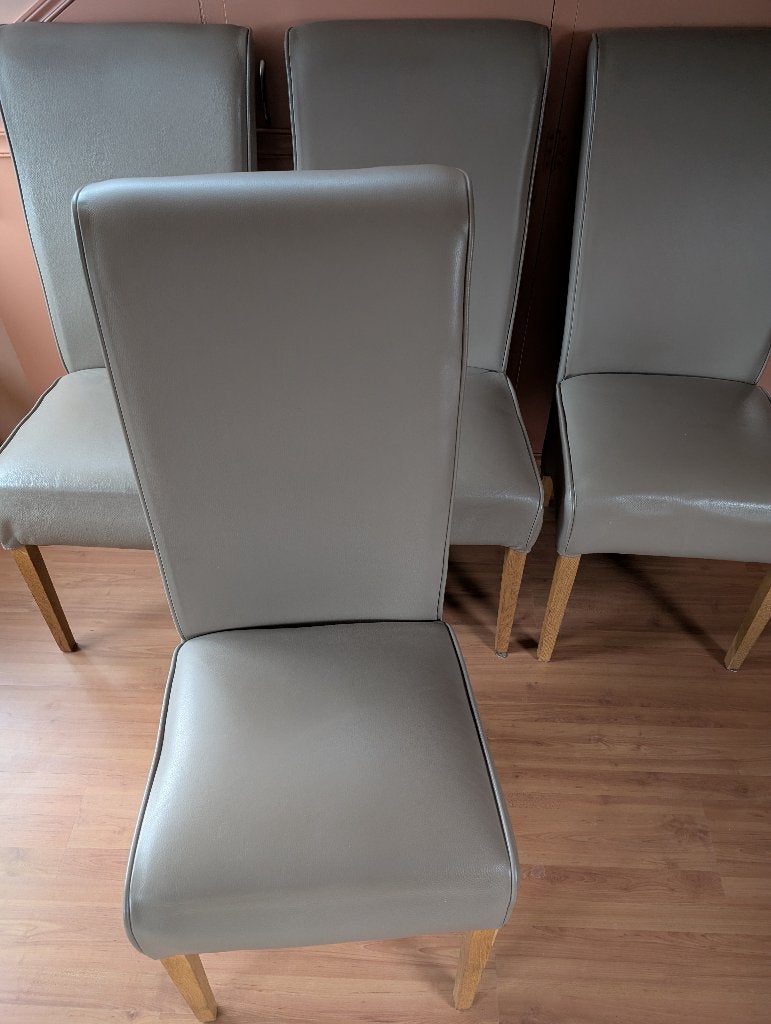 Hoge eetkamerstoelen grijs, hoogte 1060mm., Huis en Inrichting, Stoelen, Ophalen, Zo goed als nieuw, Vier, Leer