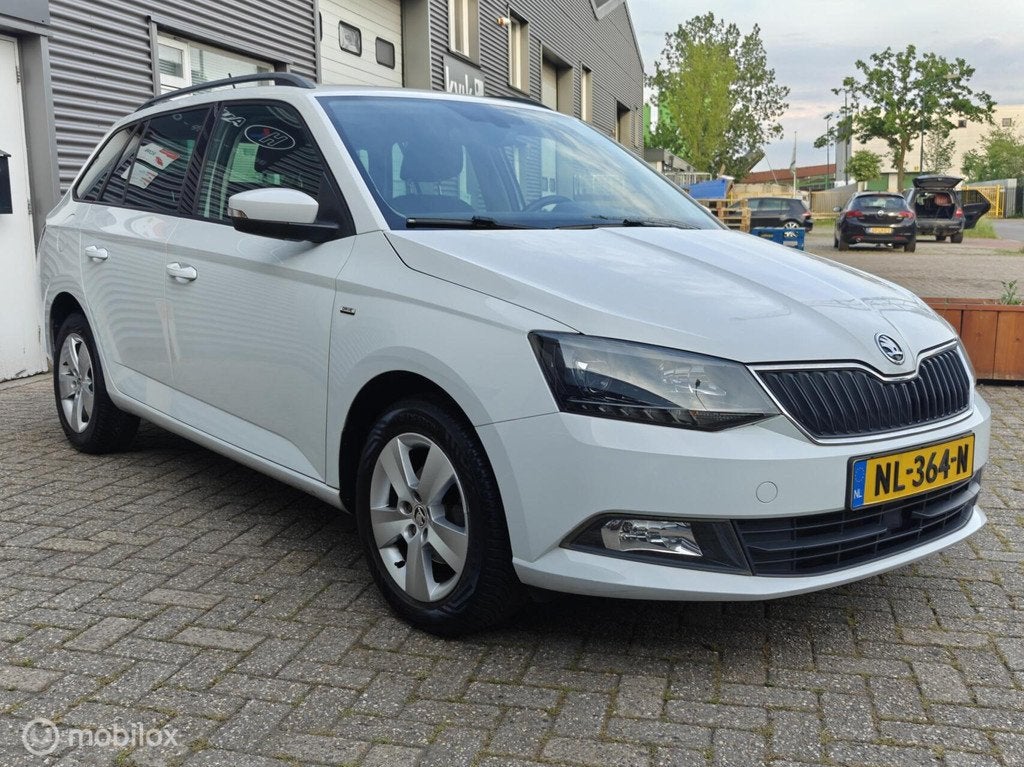 Skoda Fabia Combi 1.2TSi 90pk Drive Clima Navi LM15 PDC NAP, 40 €/maand, Euro 6, 4 cilinders, Wit