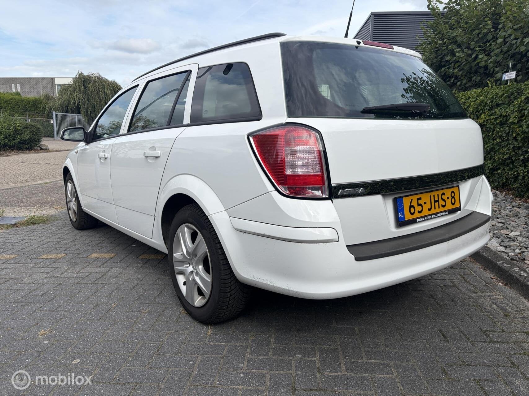 Opel Astra Wagon 1.6 Business INRUILKOOPJE / AIRCO / CDV / G, Voorwielaandrijving, Gebruikt, Zwart, Wit
