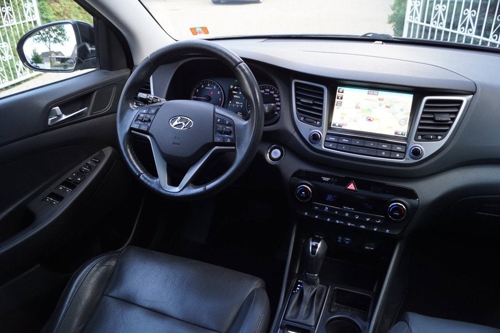 Hyundai Tucson 1.6 T-GDi Premium 4WD Autom Panodak Leder Spo, Auto's, Hyundai, Gebruikt, 4 cilinders, Zwart, Leder