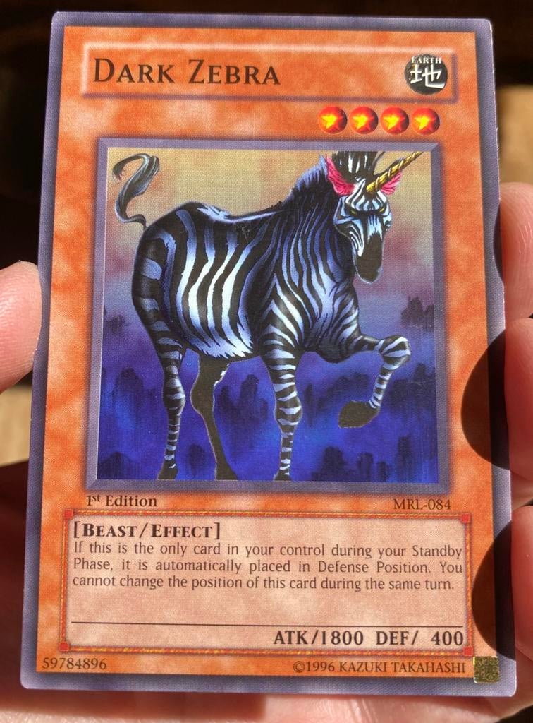 Yu-Gi-Oh! Dark Zebra MRL 1st Edition Old US Print !, Ophalen of Verzenden, Zo goed als nieuw, Losse kaart