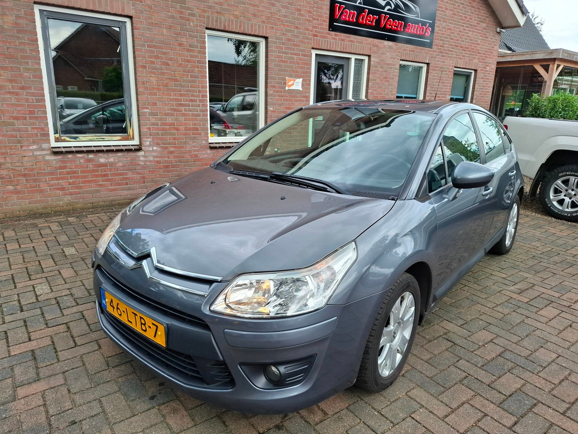 Citroen C4 1.6 HDiF Image EB6V AUTOMAAT. Schuifdak, trekhaak, Auto's, Stof, Gebruikt, Zwart, 4 cilinders