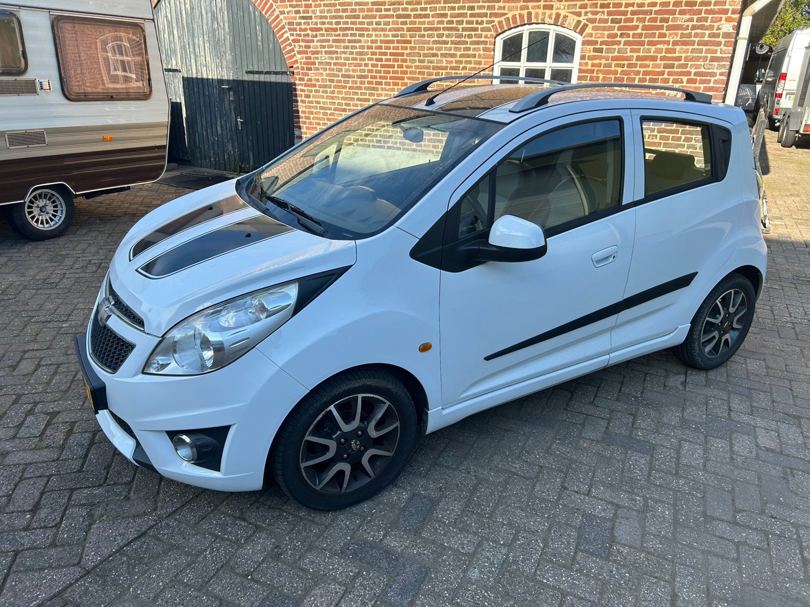 Chevrolet Spark 1.0 LS+ Bifuel 2011 Wit, Auto's, 15 km/l, 37 €/maand, 4 cilinders, Wit