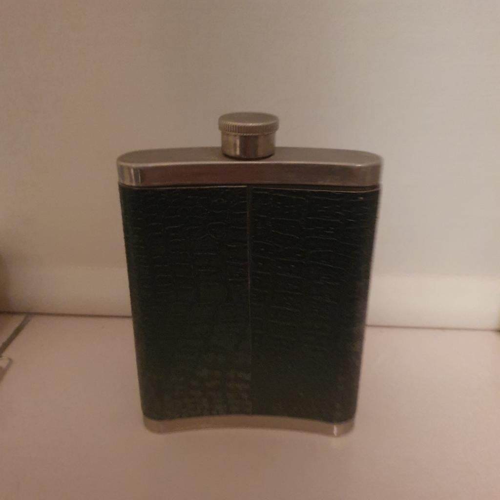 Heupfles groen met zilverkleurige dop, Ophalen