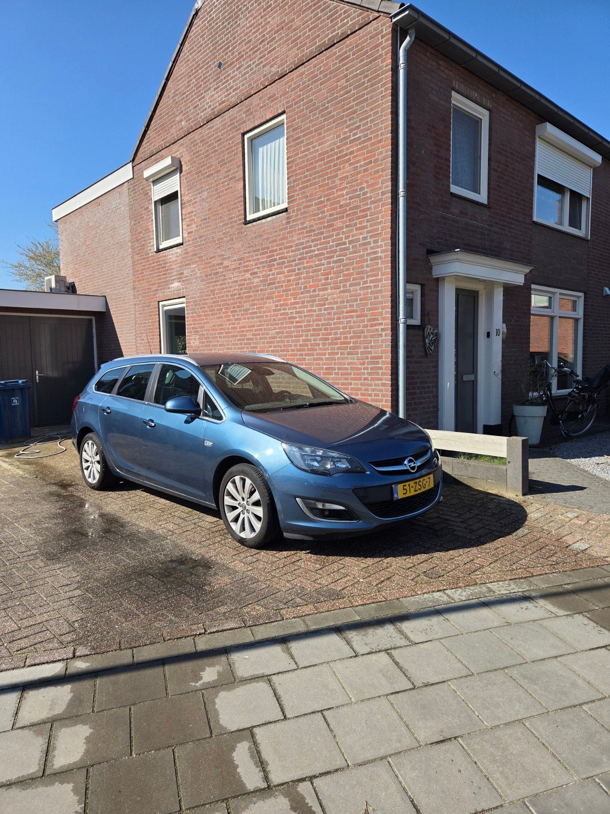 Opel Astra 1.4 Turbo 103KW Sports Tourer 2013 Blauw, Auto's, Voorwielaandrijving, Euro 5, Stof, Zwart