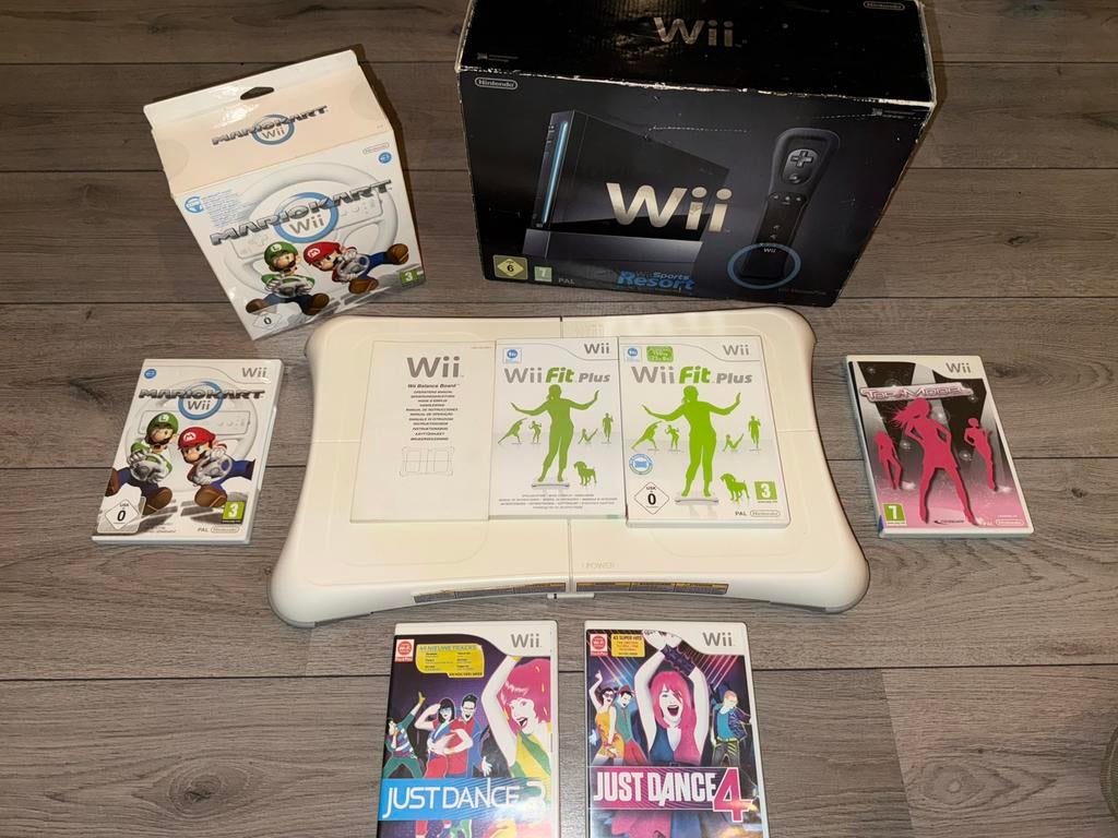 Zwarte Wii Sports Resort set, balance board + 4 spellen, Spelcomputers en Games, Spelcomputers | Nintendo Wii, Ophalen, Gebruikt