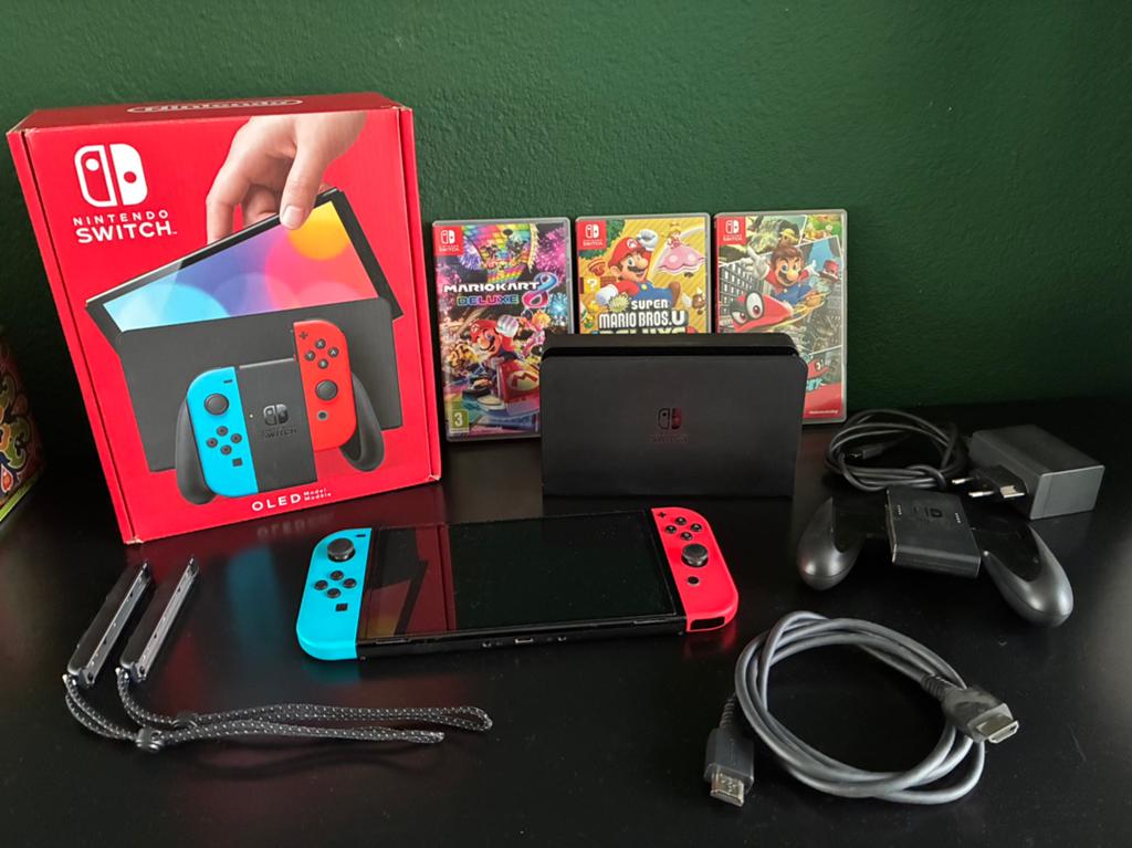 Nintendo Switch OLED eigenlijk nieuw, Switch OLED, Met games, Ophalen of Verzenden, Zo goed als nieuw