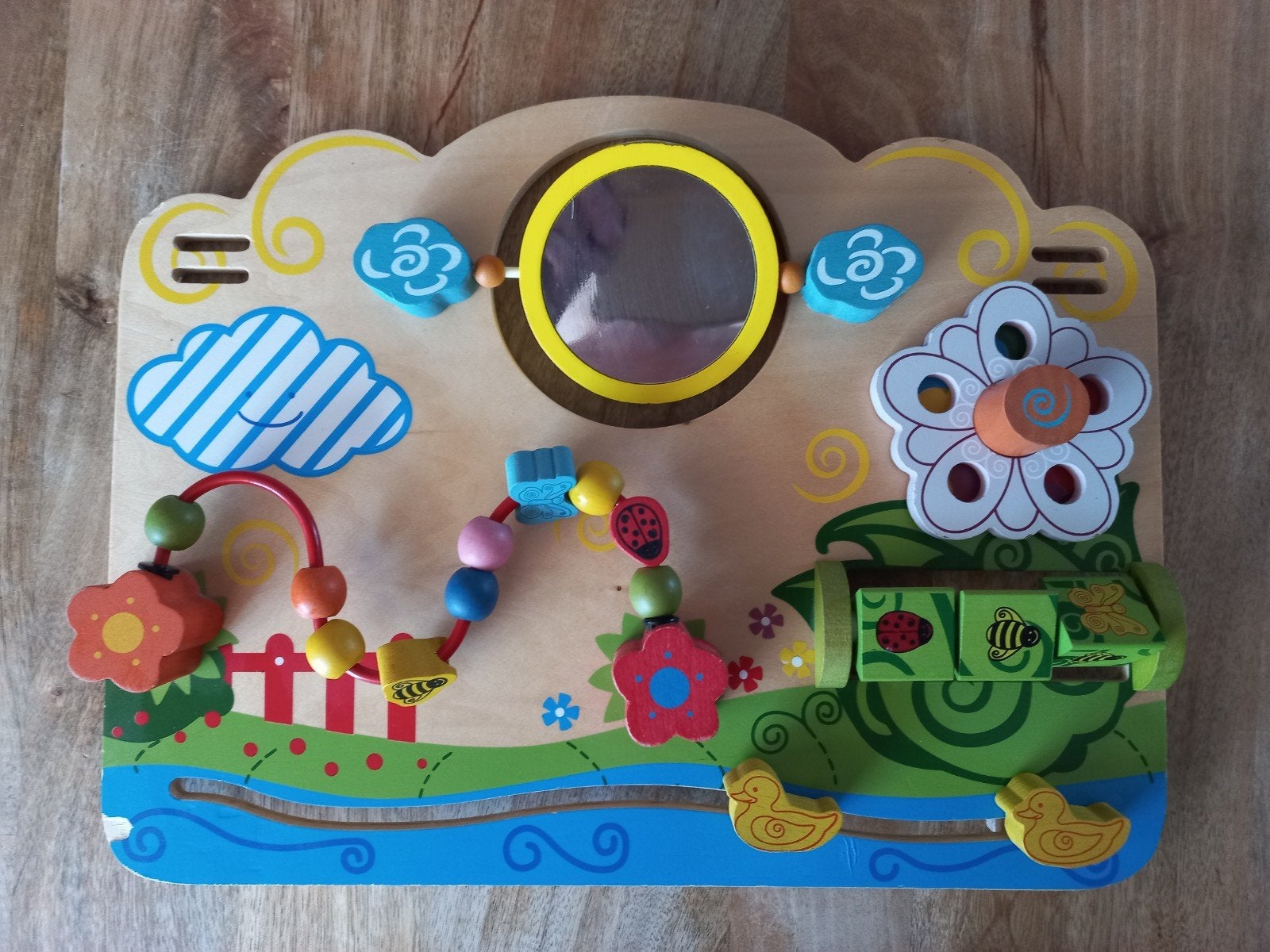 Houten babygym/speelpaneel met activiteiten, Ophalen