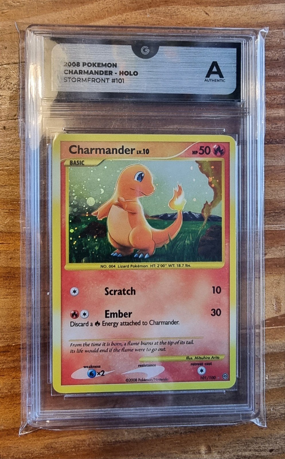 2008 Charmander Holo Stormfront #101 - Graded A Authentic, Ophalen of Verzenden, Zo goed als nieuw, Losse kaart, Foil