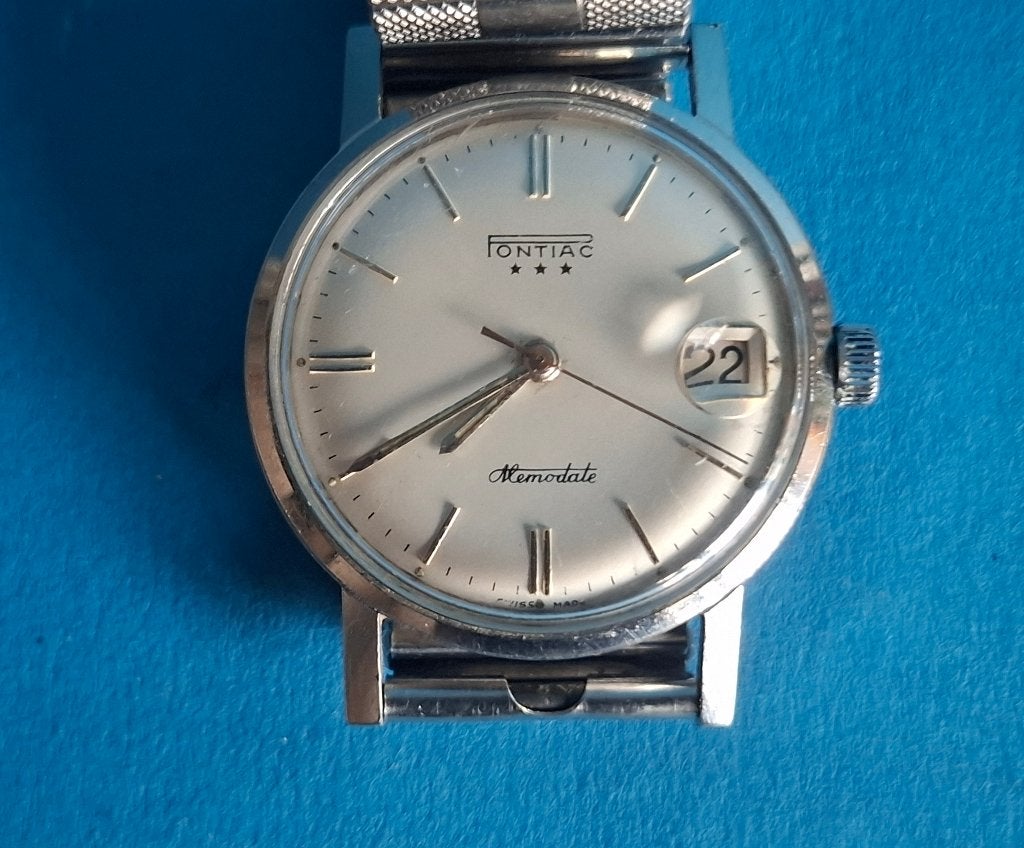 Vintage Pontiac Memodate heren polshorloge., Sieraden, Tassen en Uiterlijk, Horloges | Heren, Overige merken, Staal, Gebruikt