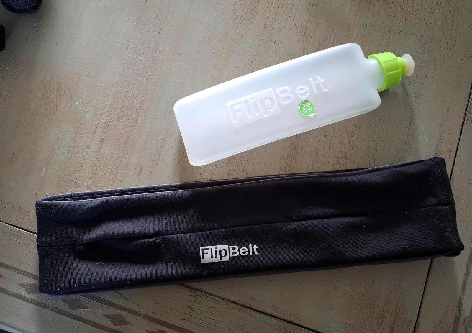 FlipBelt hardloopband met flesje - Maat Medium, Sport en Fitness, Ophalen of Verzenden, Gebruikt