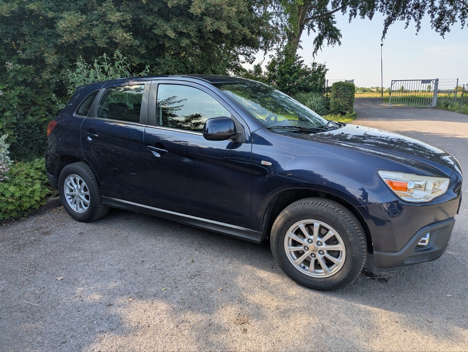 Mitsubishi ASX 1.6 86KW 2011 Blauw, Auto's, Voorwielaandrijving, Euro 5, Stof, Zwart