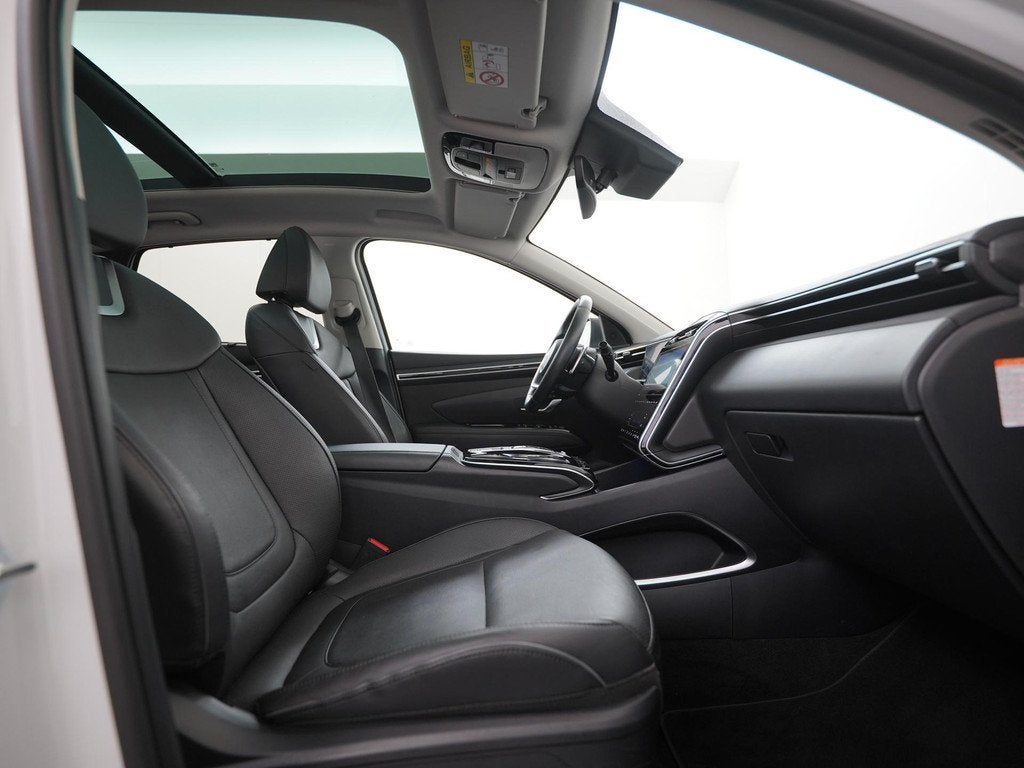 Hyundai Tucson 1.6 T-GDI PHEV Premium Sky 4WD | Panoramadak, Auto's, Hyundai, 14 kWh, Gebruikt, 4 cilinders, Wit