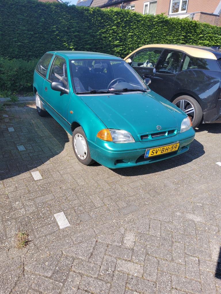 Suzuki Swift 1.3 AUT 1998 Groen, Auto's, Suzuki, Stof, 785 kg, 4 cilinders, 442 kg