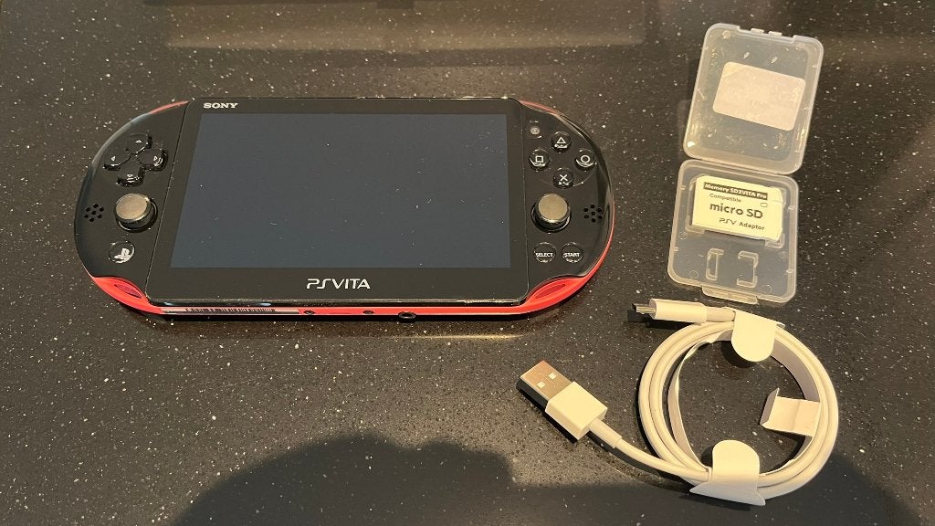 Playstation Vita Slim 2000 PSVita PS Vita Black Pink, 1 speler, Racen en Vliegen, Ophalen of Verzenden, Zo goed als nieuw