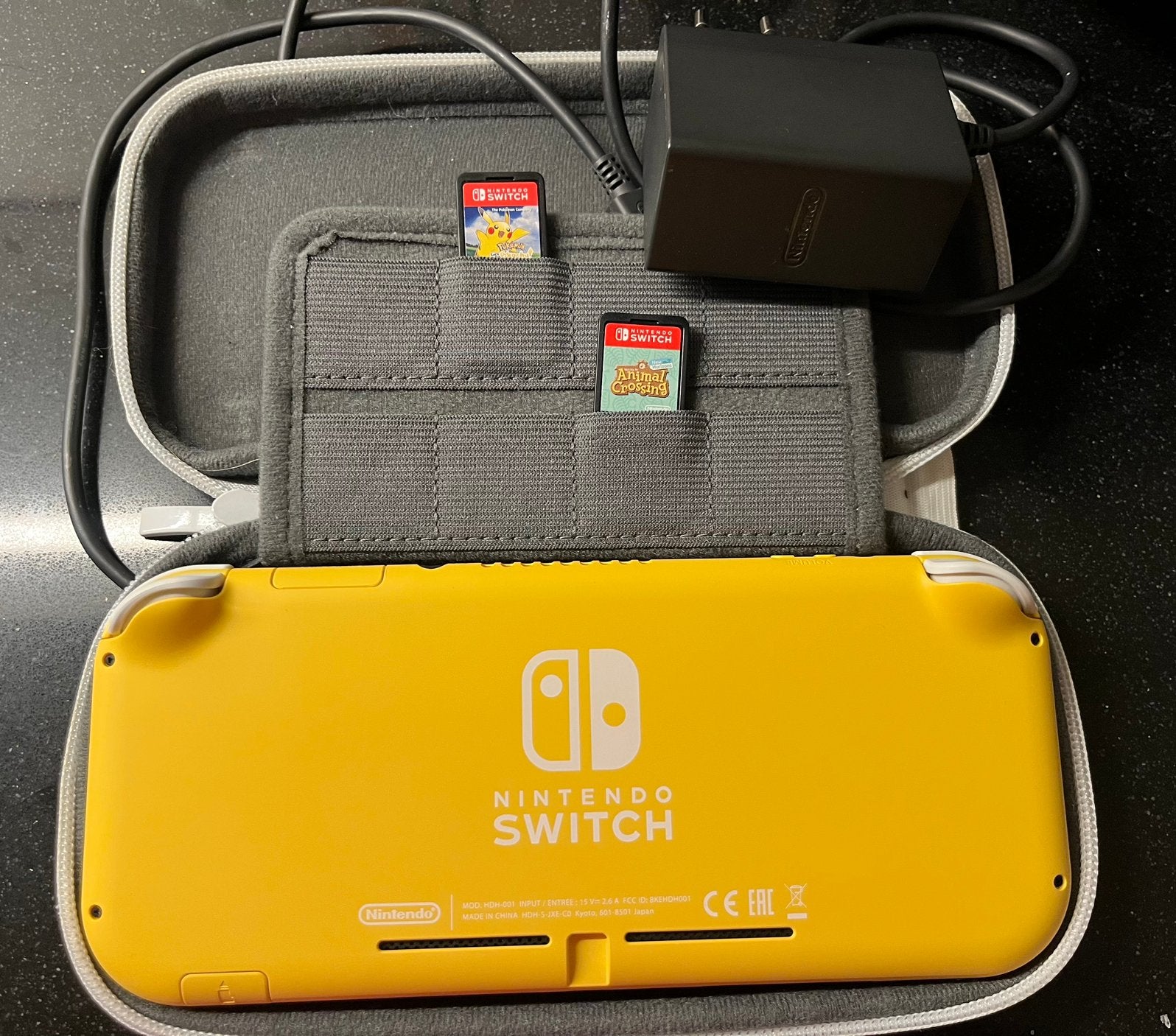Nintendo Switch Lite + 2 games, Ophalen, Zo goed als nieuw