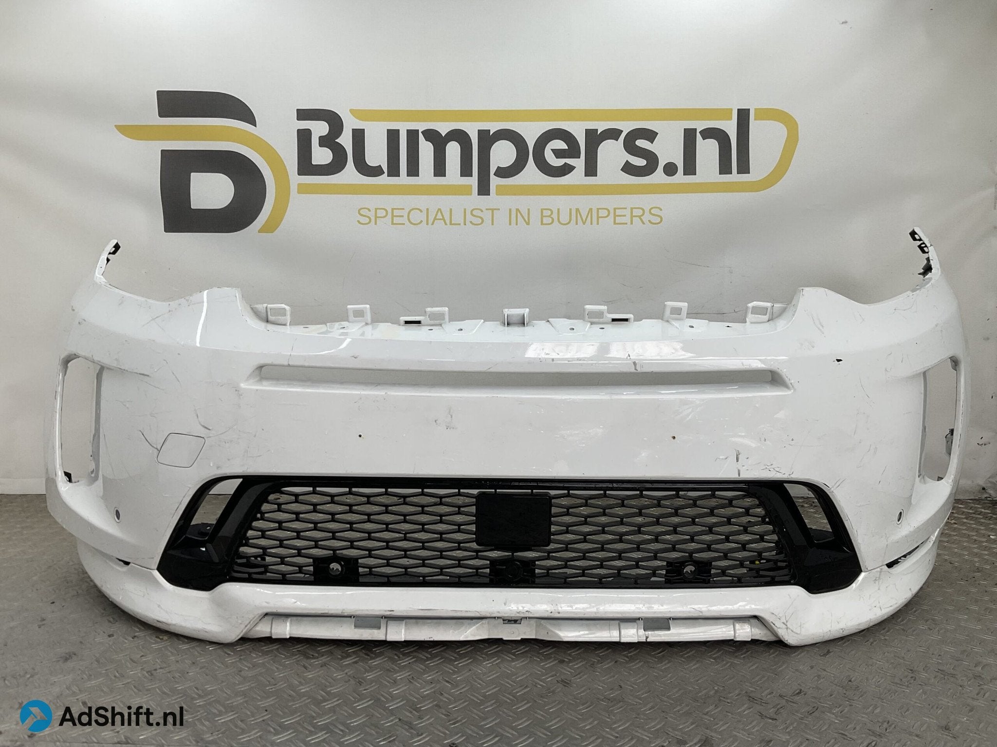 Bumper Land Rover Discovery L550 Sport LK72-17F775-B Voorbum, Auto-onderdelen, Bumper