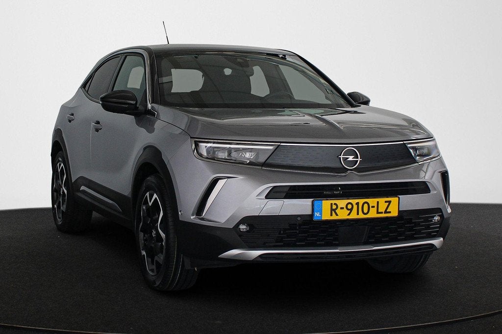 Opel Mokka-e Ultimate 50-kWh 11kw bl. 1e Eigenaar Stoel-Stuu, Auto's, Opel, 136 pk, Gebruikt, Zwart, Mokka-e