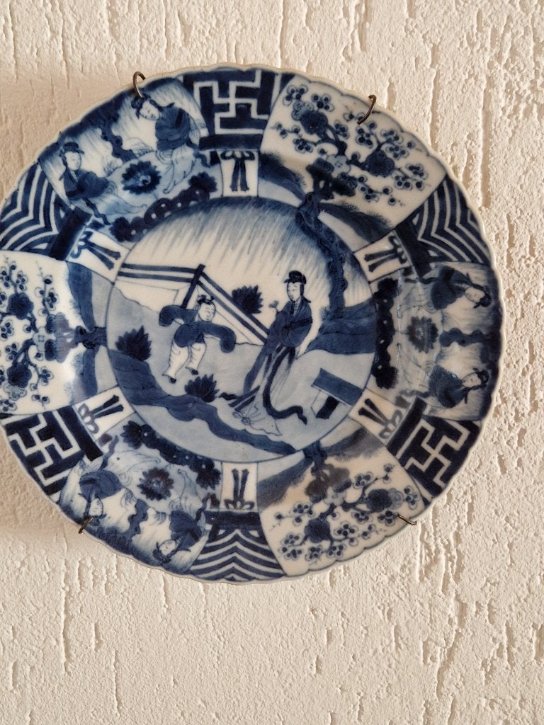 Serie van drie bordjes van chinees porcelijn Kangxi-periode, Ophalen