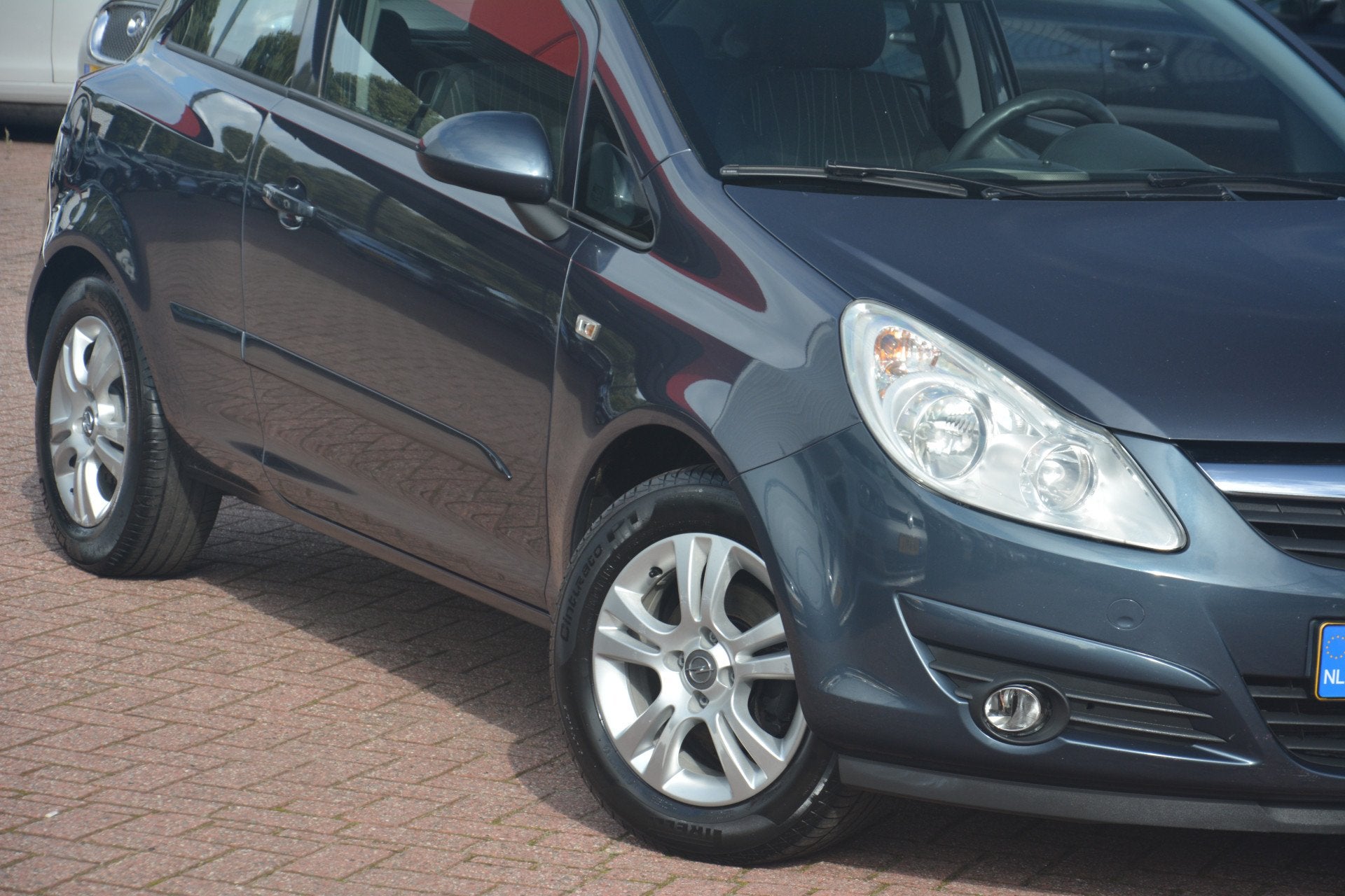 Opel Corsa 1.4-16V Enjoy | Airco | Cruise-control | Elek.ram, Auto's, Voorwielaandrijving, Gebruikt, 4 cilinders, Origineel Nederlands