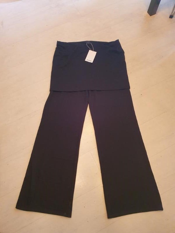 Nieuw! zwarte stretchbroek met rokje van Monki maat XL!, Verzenden, Zwart, Maat 46/48 (XL) of groter, Nieuw