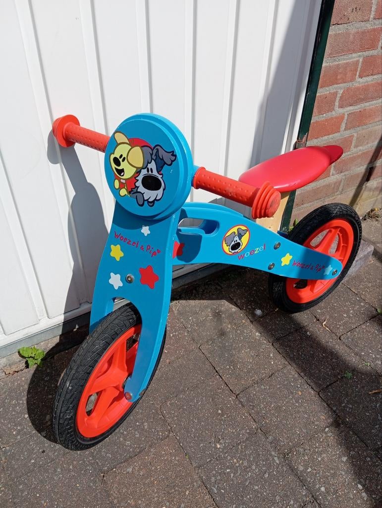 Houten loopfiets blauw van Woezel & Pip, Kinderen en Baby's, Speelgoed | Buiten | Voertuigen en Loopfietsen, Ophalen of Verzenden