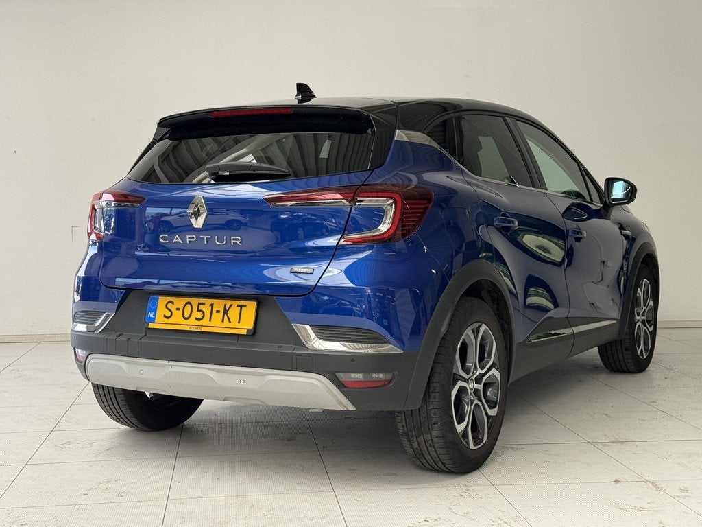Renault Captur 1.6 E-Tech full hybrid 145 Techno | Navigatie, Auto's, Gebruikt, Blauw, Leder en Stof, Origineel Nederlands