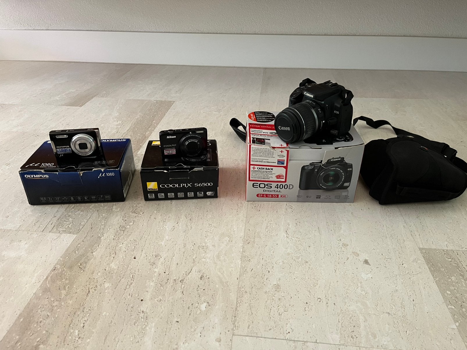Digitale camera’s ; Canon, Nikon en Olympus, Ophalen, Gebruikt