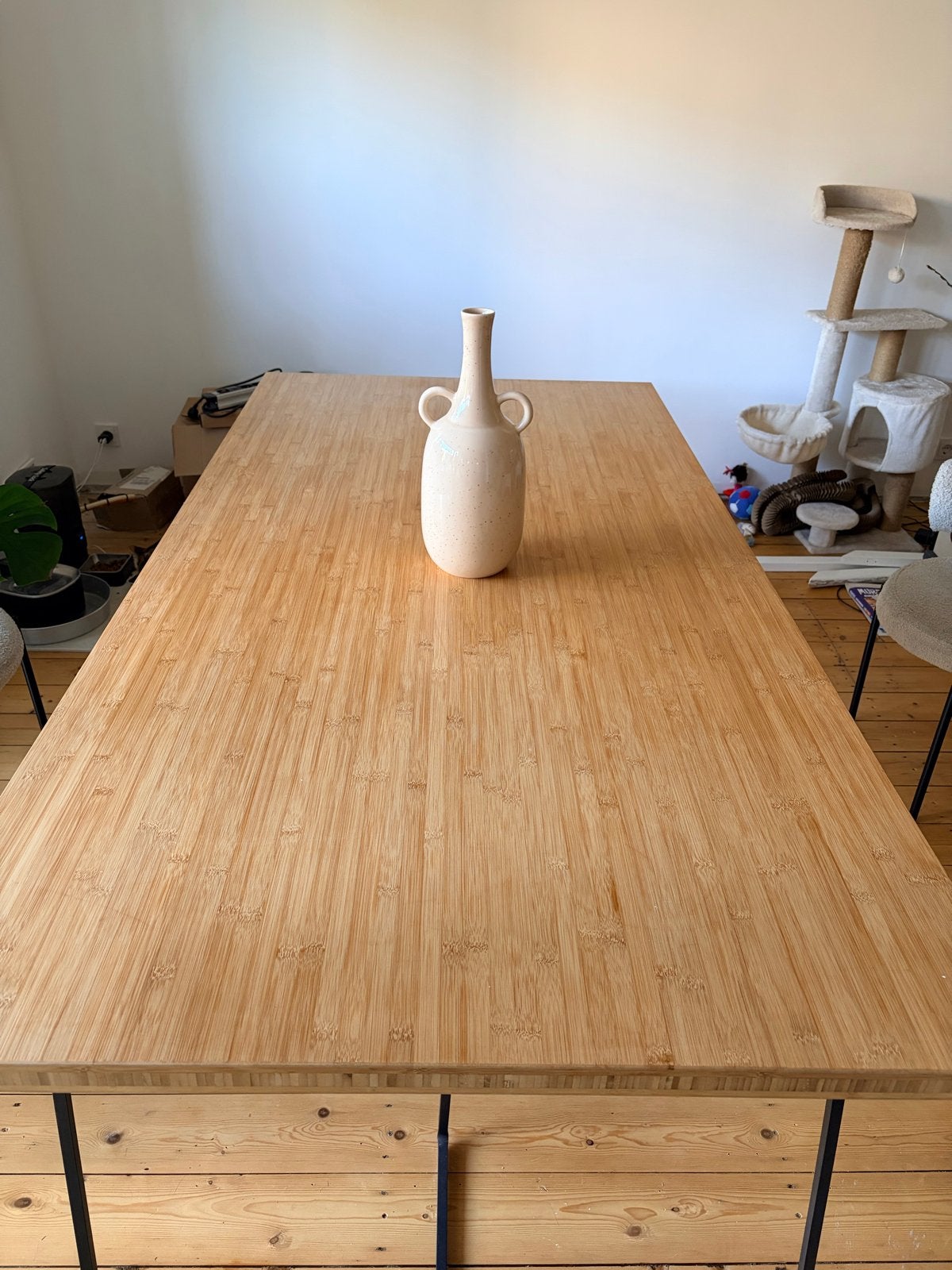 Stijlvolle eettafel met bamboe blad en metalen onderstel, Ophalen, 50 tot 100 cm, Zo goed als nieuw, Vijf personen of meer