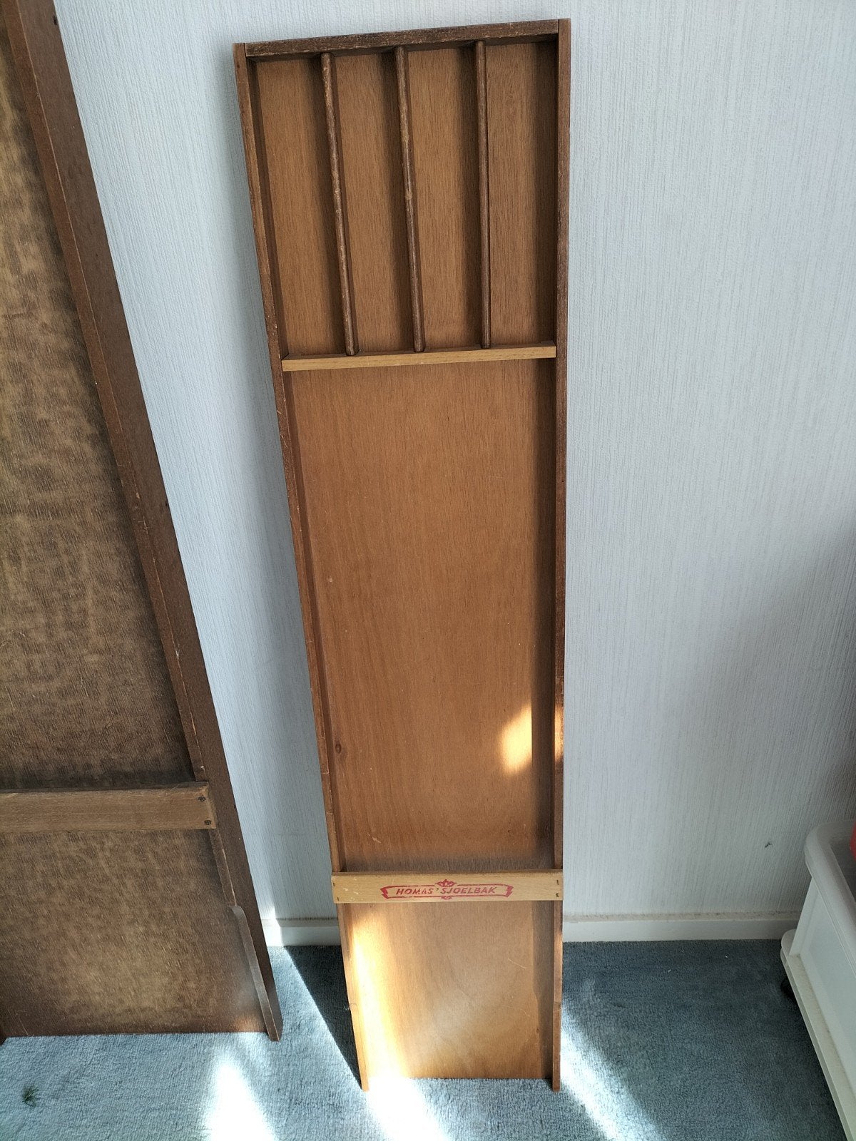 Kinder sjoelbak Homas, Ophalen