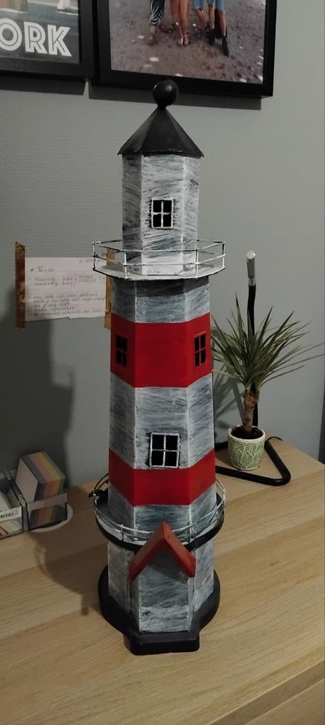 Prachtige vuurtoren, Ophalen, Zo goed als nieuw