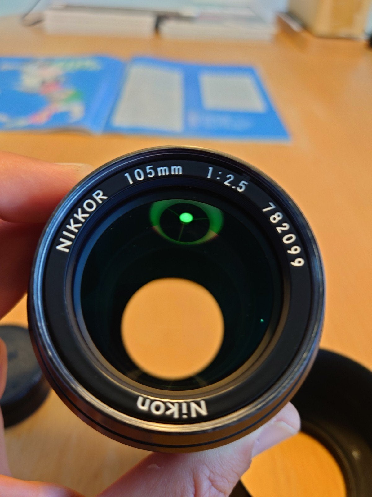 Nikon Nikkor 105mm 1:2.5 AI lens met zonnekap en filter, Ophalen, Nikon, Zo goed als nieuw, Nikon F-mount