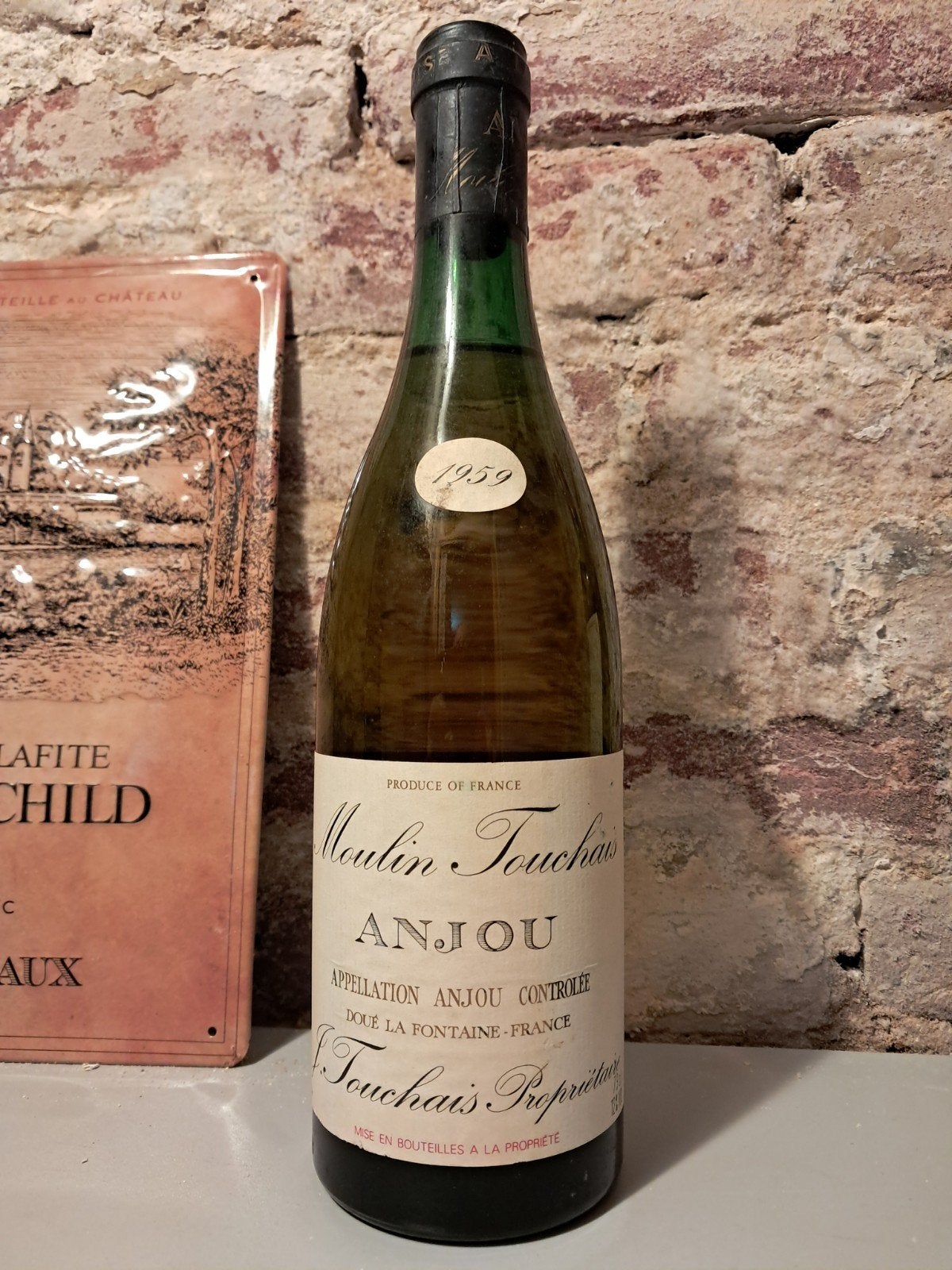 Mooie fles Moulin Touchais Anjou 1959, Verzamelen, Wijnen, Ophalen of Verzenden, Gebruikt, Frankrijk, Witte wijn