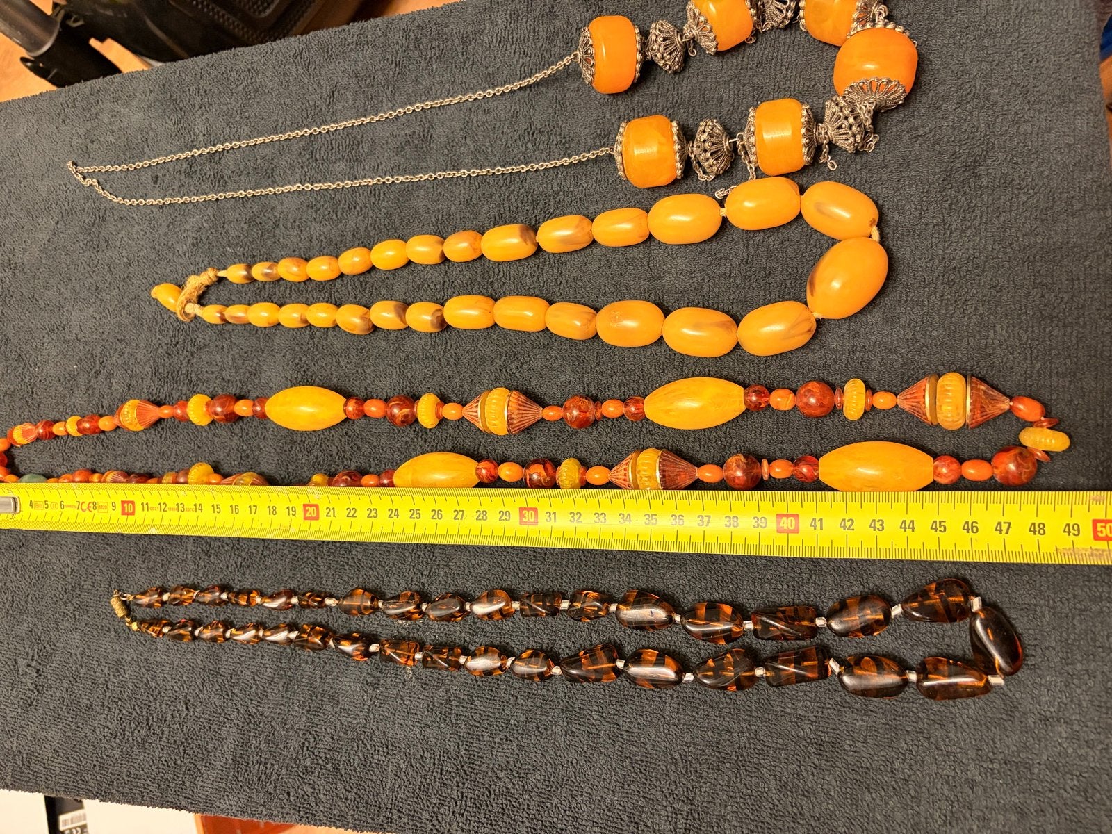 Mooie vintage kettingen in oranje en bruine tinten, Ophalen of Verzenden, Gebruikt, Oranje, Kunststof
