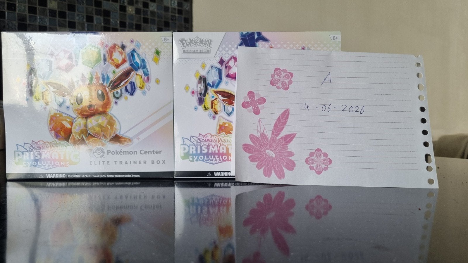 12x Prismatic Evolutions Pokemon Center Elite Trainer Box, Ophalen of Verzenden, Nieuw, Boosterbox