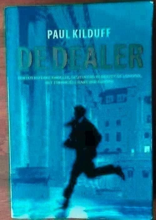 De dealer - Paul Kilduff, Boeken, Thrillers, Zo goed als nieuw, Ophalen of Verzenden