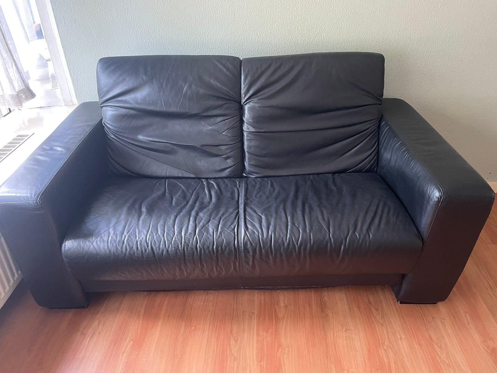 Zwarte leren tweezitsbank, Ophalen, Gebruikt, 150 tot 200 cm, Tweepersoons