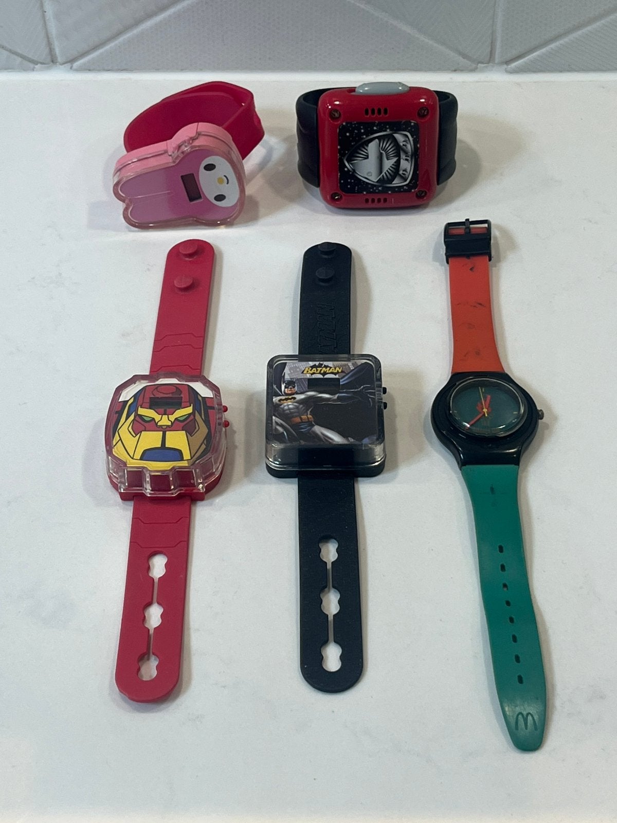 5 Kinderhorloges – Batman, Iron Man, Atlanta 1996 McDonald’s, Sieraden, Tassen en Uiterlijk, Verzenden, Gebruikt, Jongen of Meisje